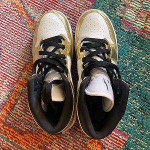 Metallic Gold Jordan 1s.